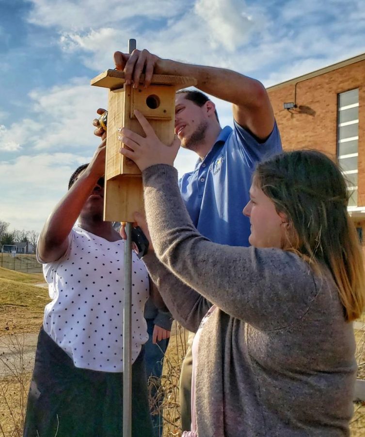 Members of K.E.N. install bluebird boxes as part of their mission to improve the environment.