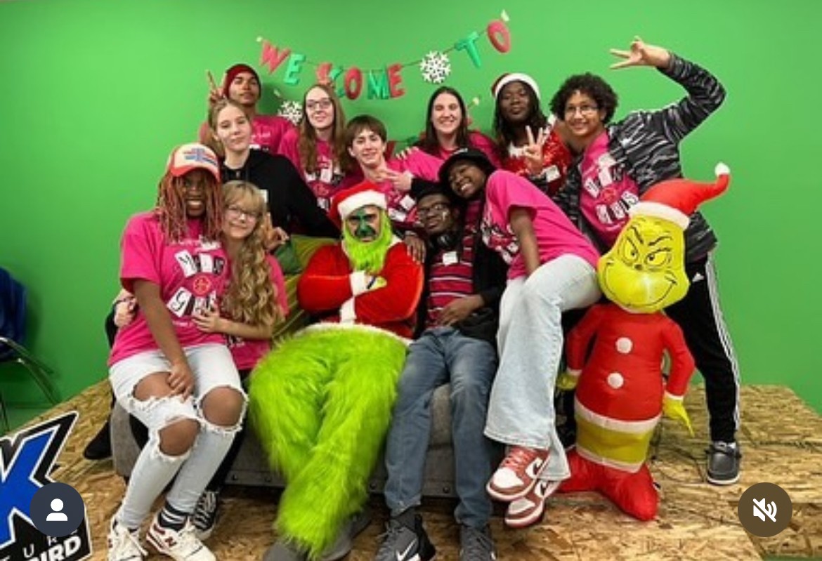 KHS students with the Grinch during Kenwood's first annual holiday market.