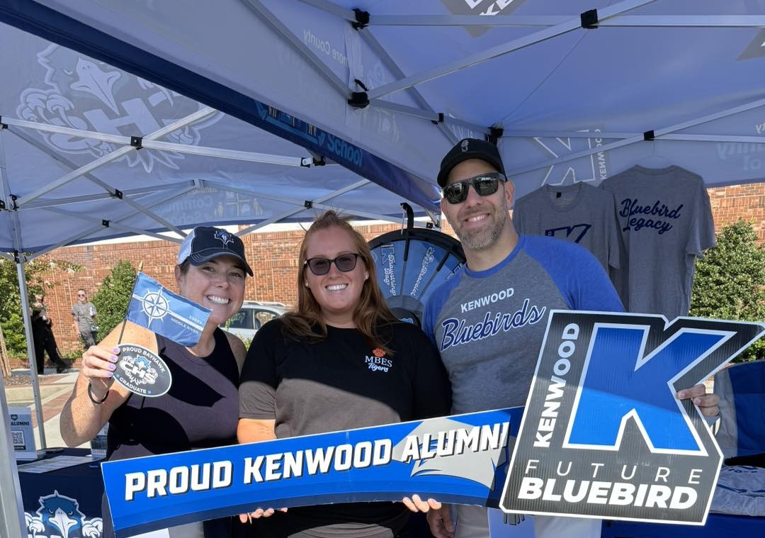 Kenwood alumni visiting the KHS tent with Mr. Goldbeck on Essex Day.