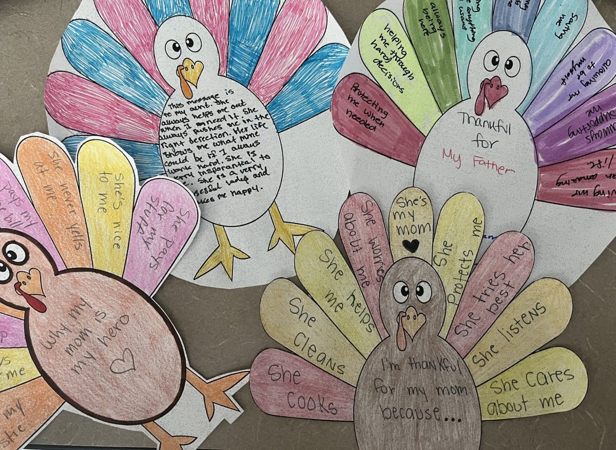 Students show what they're grateful for this holiday season. 