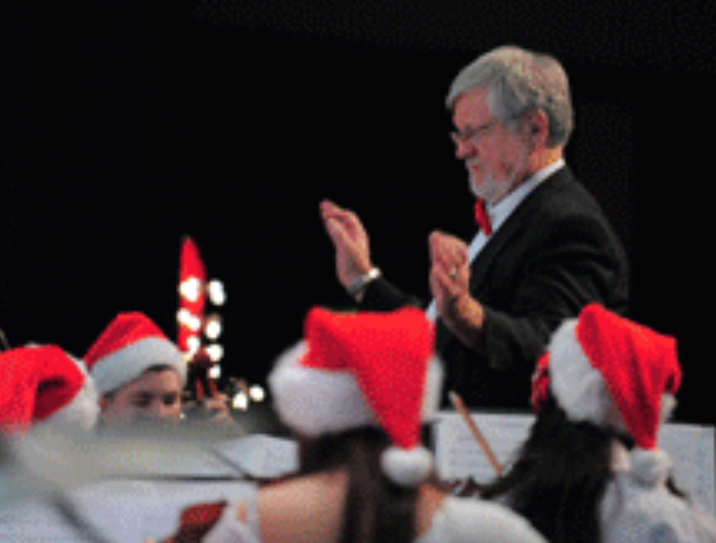 Mr. Ladd leading his musicians back during the holiday concert as they prepared for the Spring festivals. 